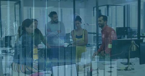 Business Team Analyzing Data Charts in Modern Office Setting