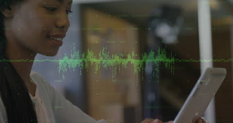 Tech Enthusiast Analyzing Digital Data on Tablet