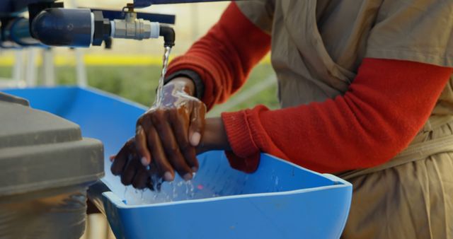 Person Washing Hands Under Outdoor Faucet - Download Free Stock Images Pikwizard.com