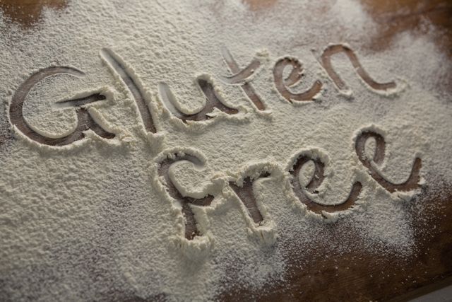 The word gluten free written on sprinkled flour - Download Free Stock Photos Pikwizard.com