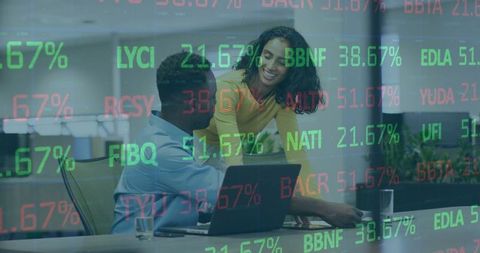 Colleagues Analyzing Stock Market Data during Team Meeting