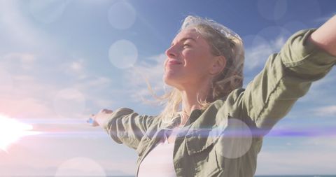 Woman Celebrating Life in Sunlit Landscape - Download Free Stock Images Pikwizard.com