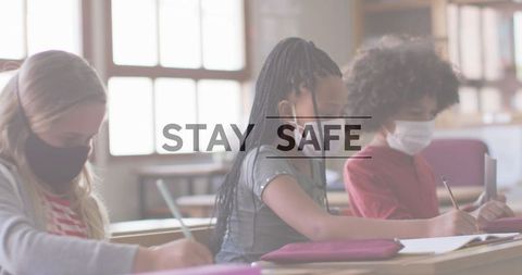 Schoolchildren Wearing Masks During Pandemic with Safety Message