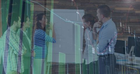 Diverse Team Analyzing Financial Data Insights in Modern Office