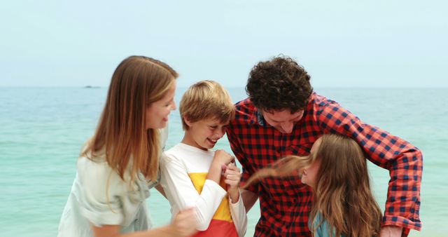 Happy Family Playing on Beach During Summer Vacation - Download Free Stock Images Pikwizard.com