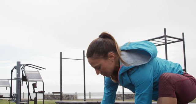 Young Woman Preparing for Outdoor Workout by Tying Shoelaces - Download Free Stock Images Pikwizard.com