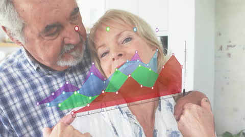 Senior Couple Embracing with Financial Data Projection
