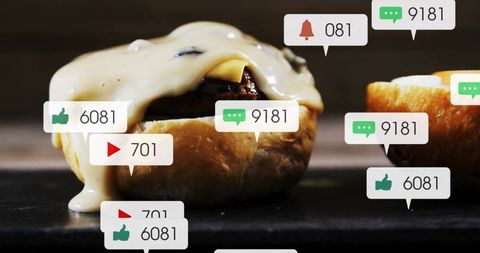 Creamy sauce dripping over chocolate-filled glazed bun with social media reaction overlays