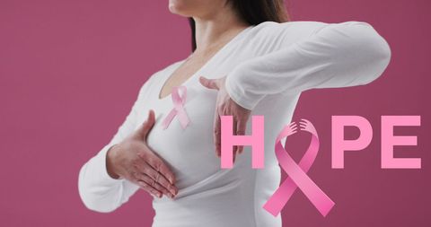 Woman Holding Breast With Pink Ribbon and Hope Emblem - Download Free Stock Images Pikwizard.com