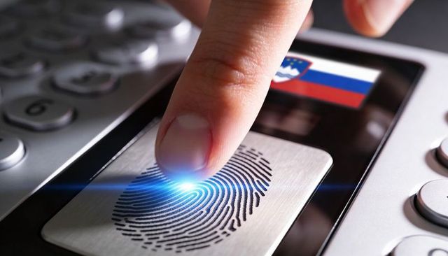 Biometric fingerprint access control touching scanner with blue led and slovenian flag