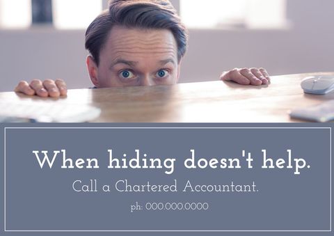 stressed man hiding behind desk illustrating tax anxiety - Download Free Stock Templates Pikwizard.com