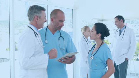 Medical Professionals Collaborating in Modern Setting