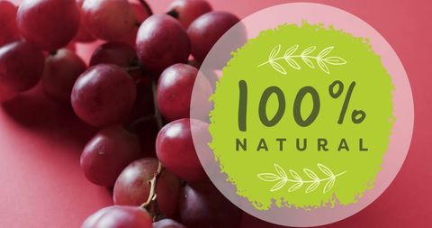 Colorful 100 Percent Natural Grapes Display on Pink Background - Download Free Stock Images Pikwizard.com
