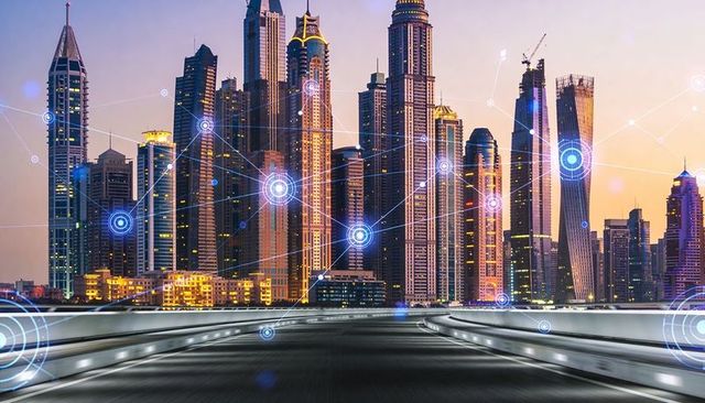 Futuristic smart city skyline at dusk with glowing network overlay and connected skyscrapers