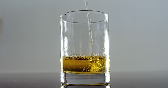 Pouring Refreshing Apple Juice into a Clear Glass - Download Free Stock Images Pikwizard.com