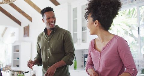 Happy African American Couple Cooking Together in Kitchen - Download Free Stock Images Pikwizard.com