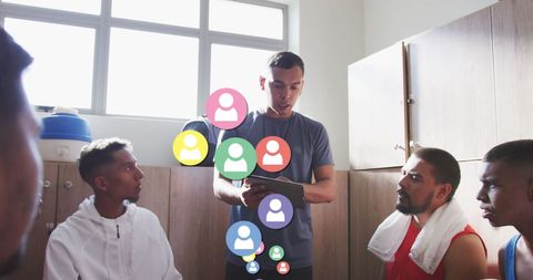 Male Coach Using Technology for Team Strategy Discussion - Download Free Stock Images Pikwizard.com
