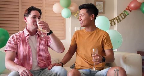 Gay Couple Toasting Birthday Celebration Happiness