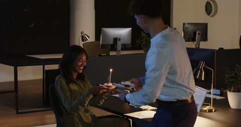 Celebrating colleague's birthday in modern office setting