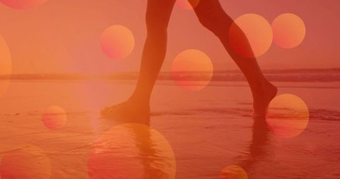 Tranquil beach stroll with bokeh aesthetics at sunrise