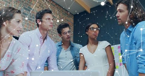 Team Brainstorming in Office with Digital Network Overlay