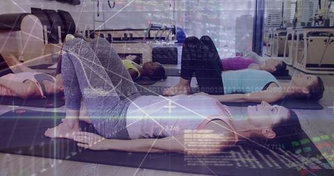 Women practicing pilates in studio overlayed with graphic patterns