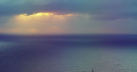 Sunset Sail on Misty Blue Ocean - Download Free Stock Images Pikwizard.com