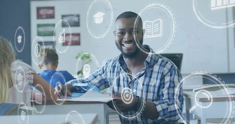 Smiling teacher reaching across desk guiding students with floating digital learning icons