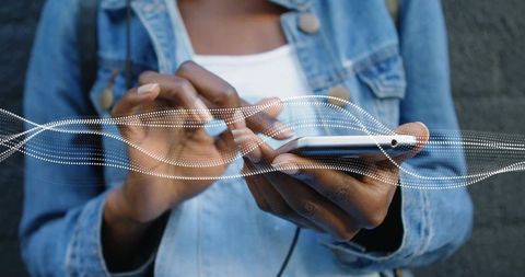 Hands tapping smartphone with dotted waveform overlay showing mobile audio interaction