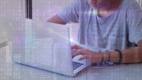Young Adult Typing with Digital Code Overlay