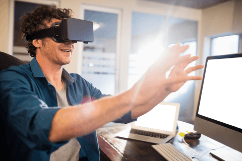 Businessman Engaged by Virtual Reality in Modern Office Space