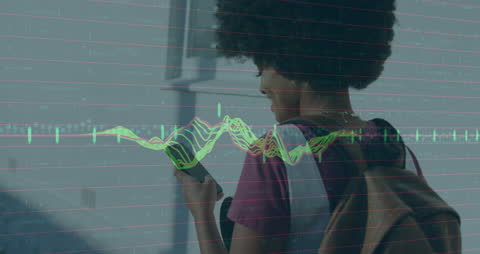 African American Woman Analyzing Data on Smartphone