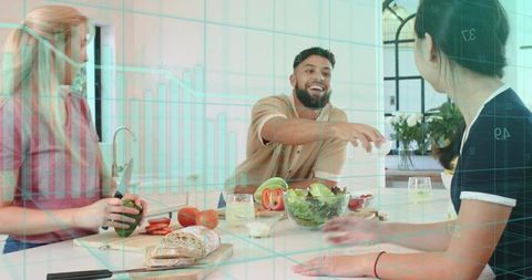 Friends preparing meal at kitchen island with data visualization overlay