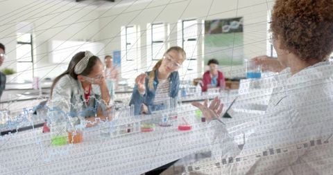 Science teacher demonstrating chemistry experiment with students observing and data overlay