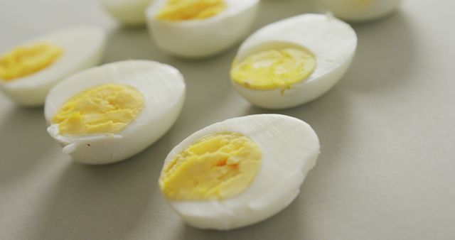 Close-up of Sliced Hard-Boiled Eggs on Light Surface - Download Free Stock Images Pikwizard.com