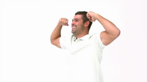 Joyful Man Cheering with Enthusiasm in White Studio