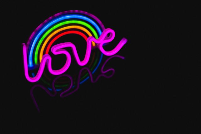 Neon Rainbow Love Sign on Black Background - Download Free Stock Photos Pikwizard.com