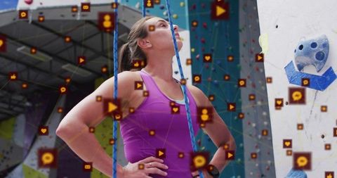 Woman Preparing for Indoor Lead Climb with Social Media Data Overlay