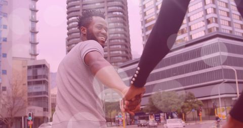 Happy Couple Holding Hands in Urban Environment