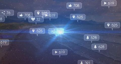 Glowing social media notification bubbles floating over night beach with blue light burst