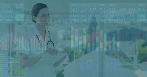 Doctor Analyzing Data on Tablet in Modern Hospital Environment