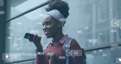 Woman Engaging with Smartphone Amid Social Media Icons in Urban Environment - Download Free Stock Images Pikwizard.com