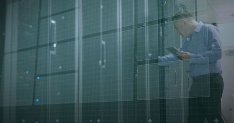 Technician Reviews Data Servers for Network Security in Office Environment - Download Free Stock Images Pikwizard.com