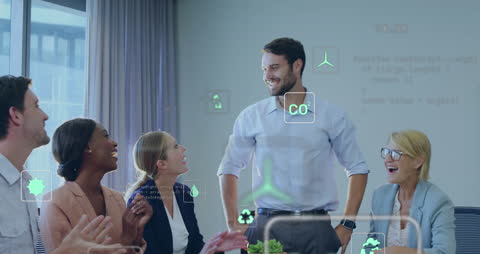 Diverse Team Engaged in Collaborative Meeting with Digital Elements