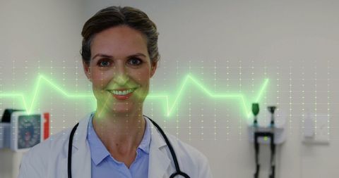 Caucasian Female Doctor with Digital Cardiogram Overlay