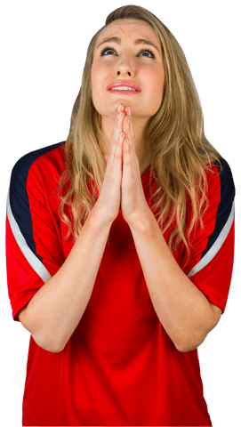 Nervous Football Fan Wearing Red Holding Hands in Prayer
