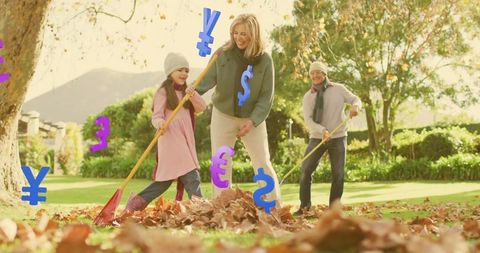 Multigenerational family raking autumn leaves with floating currency symbols for lifestyle