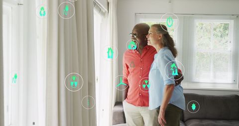 Senior Couple Embracing Technology with Eco-Friendly Icons