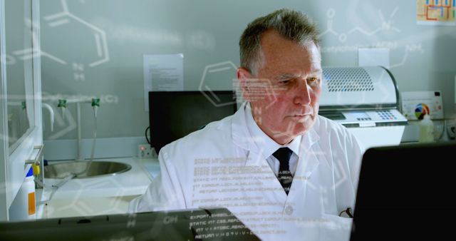 Image of medical data processing on caucasian senior male scientist using computer at laboratory. Medical research and science technology concept