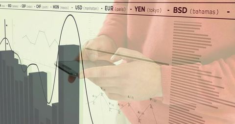 Businessman using smartphone amid global finance indicators